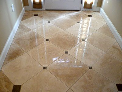 Shiney foyer tile floor with dots
