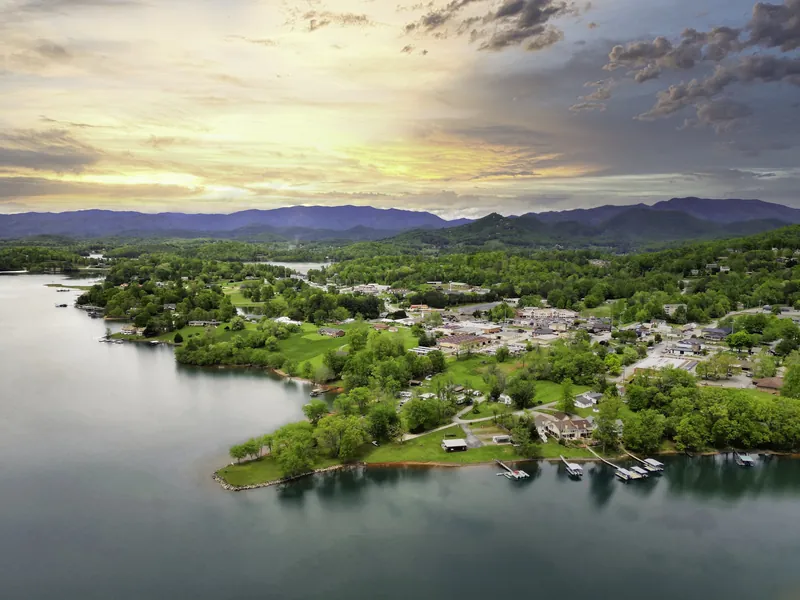 Aerial view of Hiawassee and the coves of Lake Chatuge with mountains behind