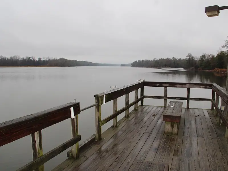 Wooden fishing pier over Lake Walter F. George at Florence Marina State Park