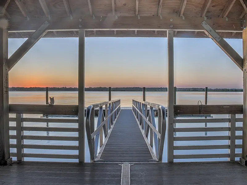 Covered dock at sunset on Lake Blackshear at Georgia Veterans State Park