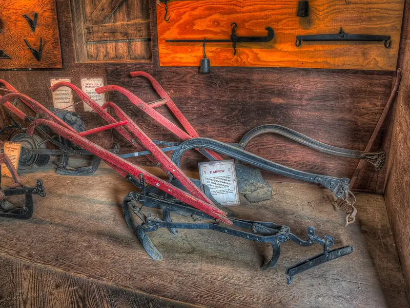 Antique plows and farm tools on display in the Hamburg State Park museum