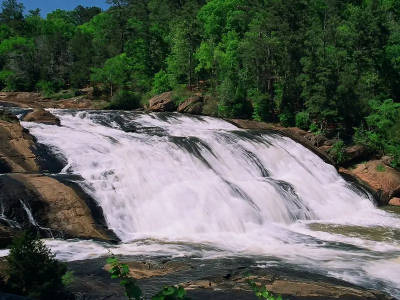 Water rushing over granite ledges on the Towaliga River at High Falls State Park