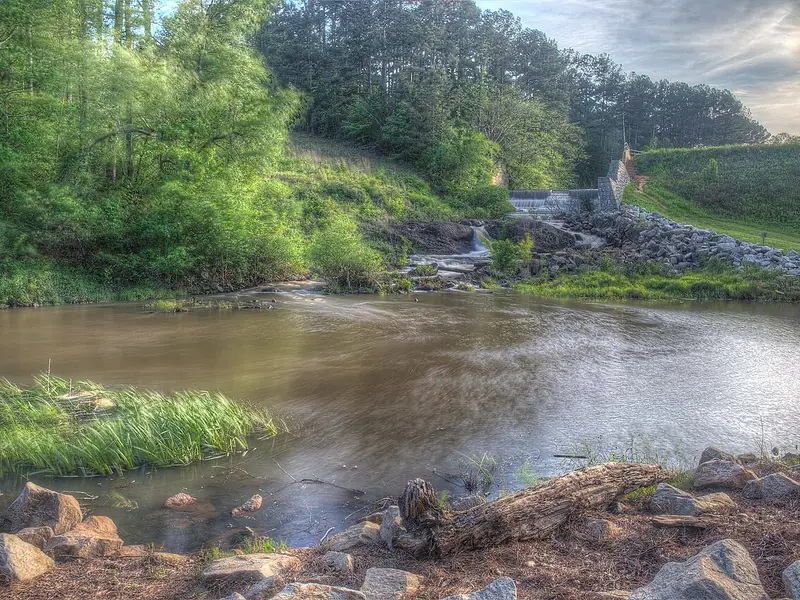 Sandy Creek flowing past rocks at Indian Springs State Park