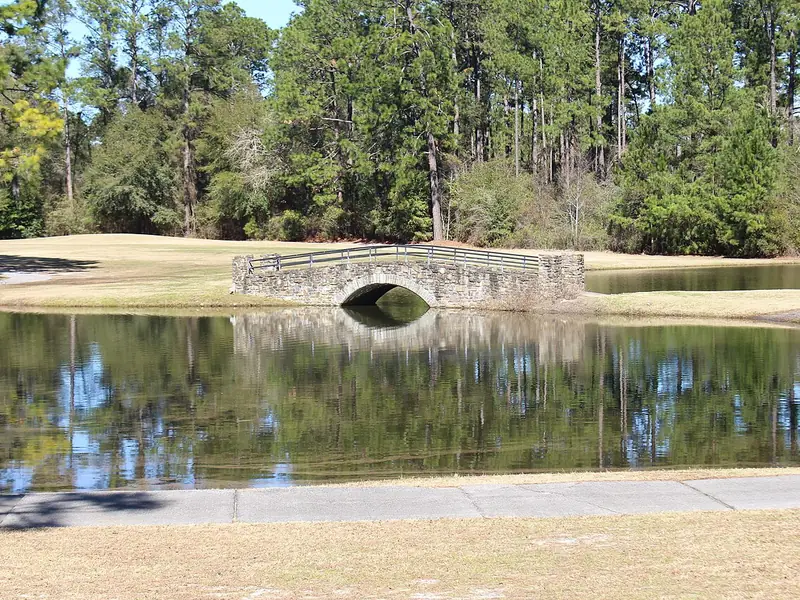 Ponds and a stone bridge on the Wallace Adams Golf Course at Little Ocmulgee State Park