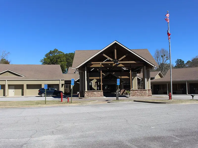 Lodge building with a covered entrance at Little Ocmulgee State Park