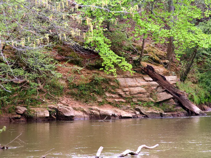 Middle Oconee River along a red clay and rock bank near Athens