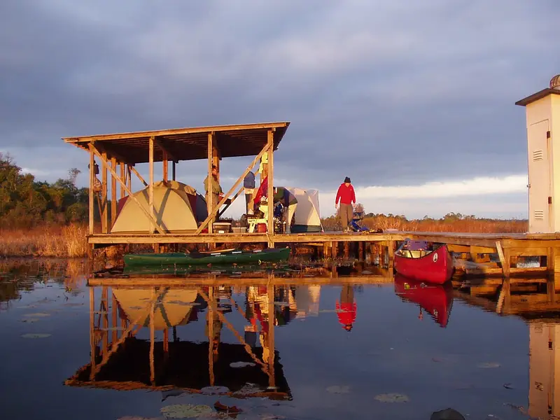 A covered camping platform on the water in the Okefenokee wilderness