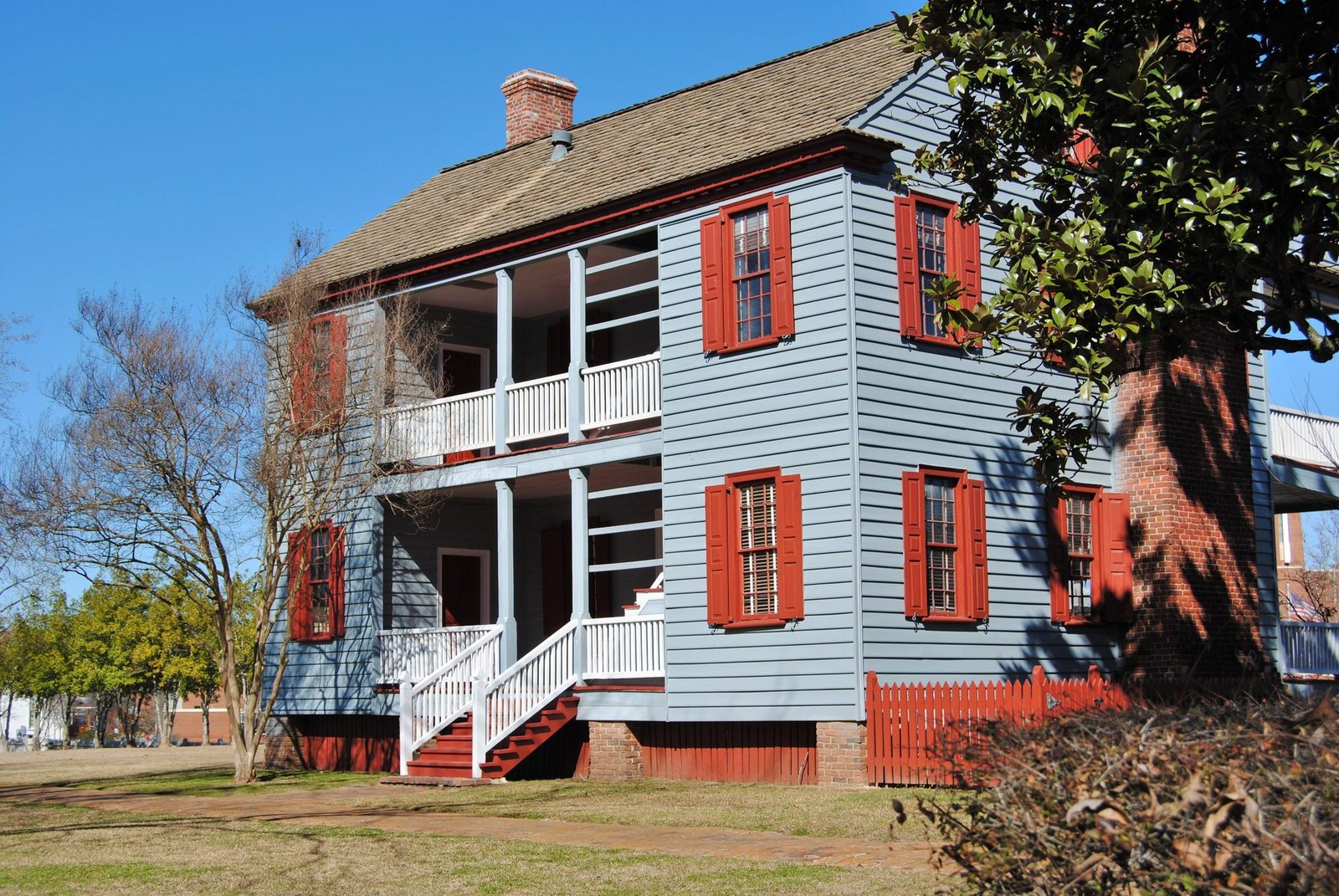 The 1797 Ezekiel Harris House, a two-story Federal-style frame house with red shutters, in Augusta