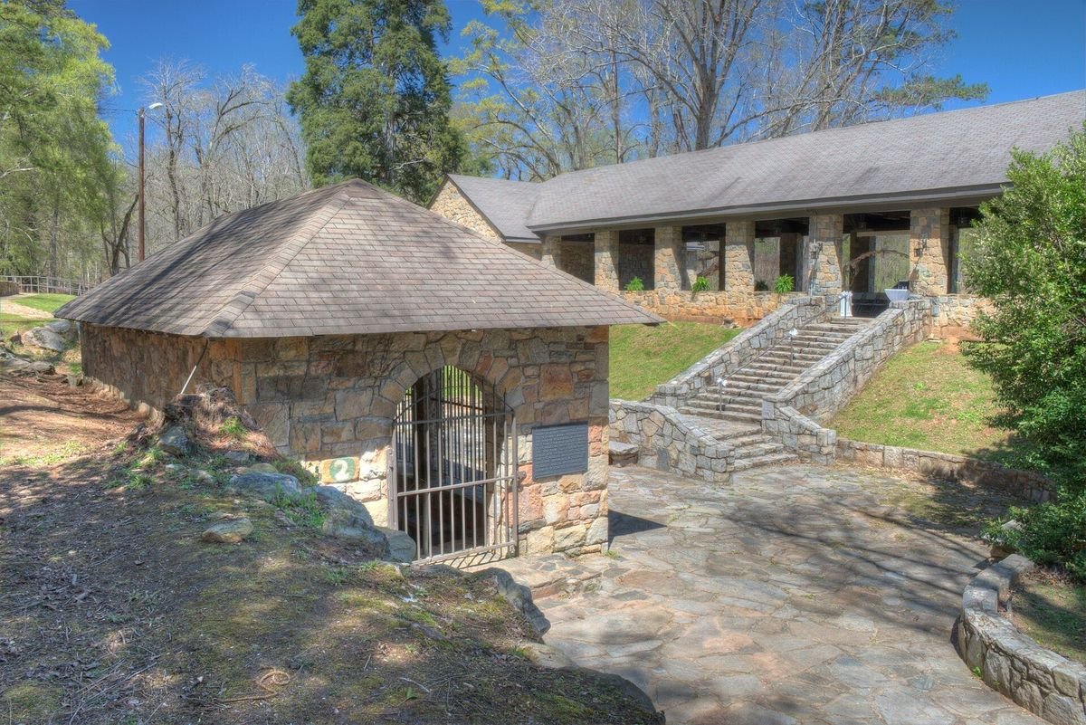 Historic stone spring house and pavilion at Indian Springs State Park