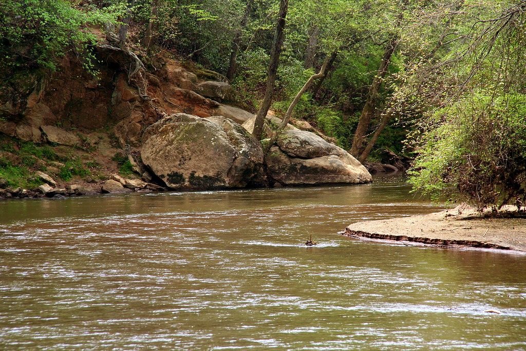 The Middle Oconee River flowing past a sandbar and rock outcrop near Athens, Georgia