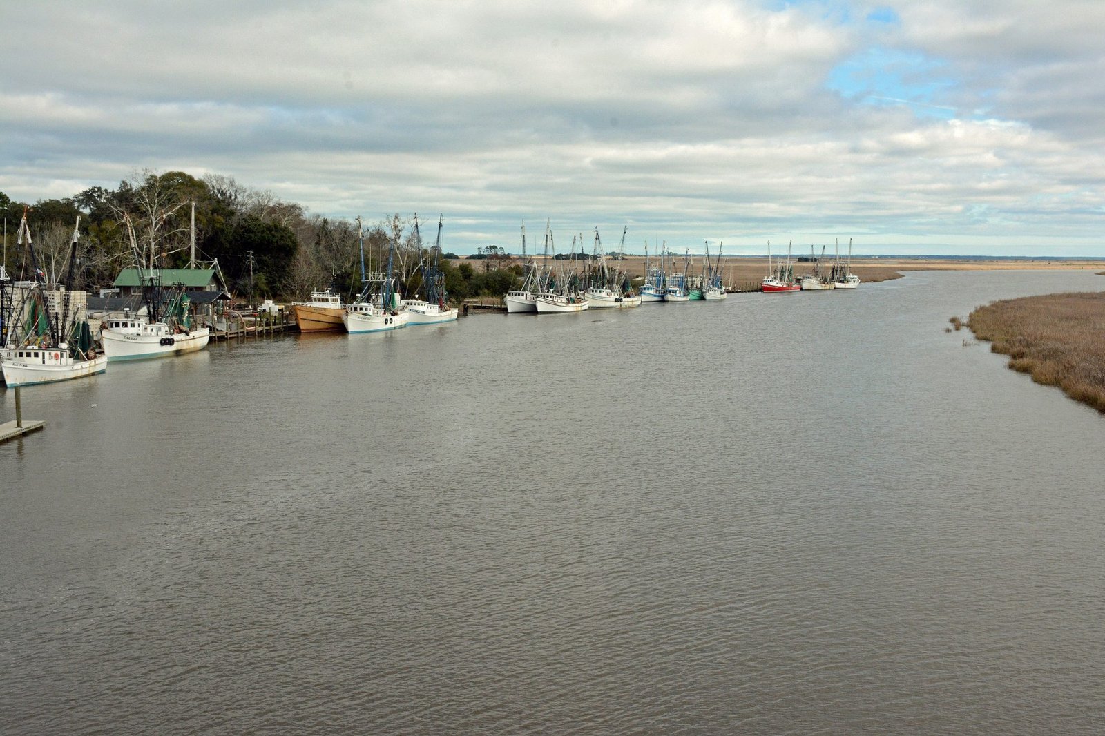 Shrimp boats along the Darien River with salt marsh beyond
