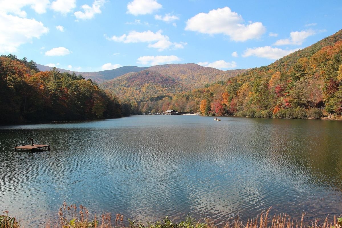 Lake Trahlyta surrounded by fall foliage at Vogel State Park